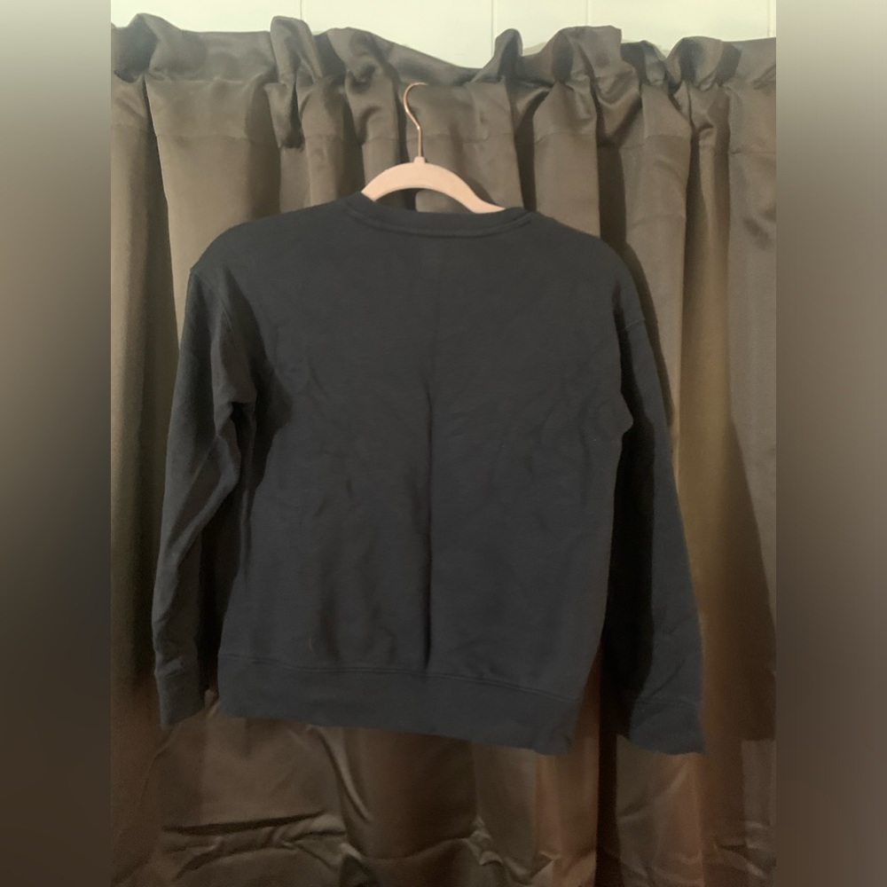 Black athletic works long sleeve t-shirt. Kids large. Great condition.